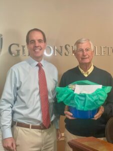 GibsonSingleton partner Ken Gibson congratulates the first “Hometown Hero” winner, Lester Sterling of Gloucester. Several people nominated Sterling, describing him as a “selfless, devoted community servant.”